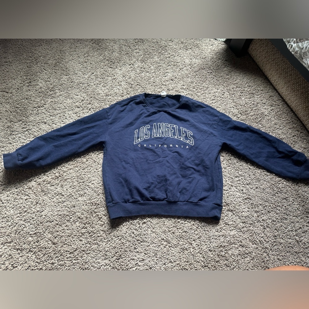 Blue sweater.